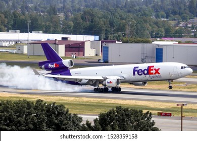 Portland, OR / USA - May 2018: Heavy Landing Of A FedEx MD-11 At Portland International Airport (PDX).