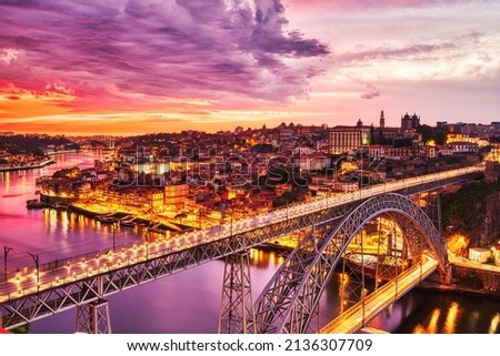 Porto Aerial Cityscape with Luis I Bridge and Douro River at Amazing Sunset, Portugal