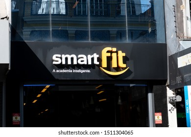 Porto Alegre, Brazil - June, 24 2019. Old Downtown, The Historic City Center: Business District. Facade Of Smart Fit Branch. Gym Franchise Store, Advertising Sign And Logo.