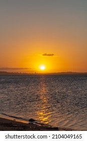 Porto Alegre, Rio Grande Do Sul, Brazil - Jan 9th 2022: Sunset Lake Guaíba