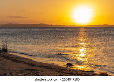 Porto Alegre, Rio Grande Do Sul, Brazil - Jan 9th 2022: Sunset Lake Guaíba