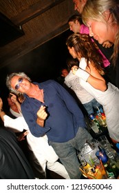 Porto Cervo, Olbia/Italy - 08/08/2004: Flavio Briatore In His Local Billionaire Club In Porto Cervo, Sardinia Island