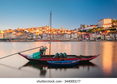 Porto city, Portugal. Traditional boats in the Douro River in sunny day 