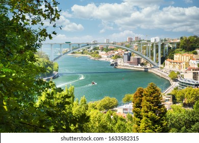 Porto (Oporto) And Douro River From The Jardins Do Palacio De Cristal. Arrabida Bridge Is The Only One In Europe That Visitors Can Climb.