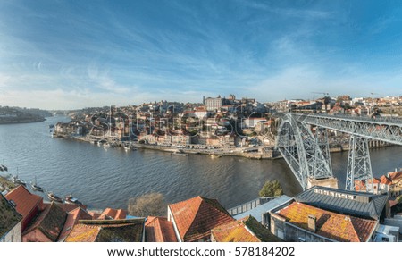 Similar – Blonde woman looks at bridge in Porto