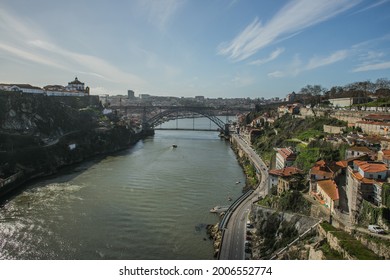 Porto, Portugal - 12 July 2021: View Of Iconic Ponte Dom Luís I (Dom Luís I Bridge) From Ponte Do Infante (Infante Bridge) During A Sunny Afternoon In Winter.
