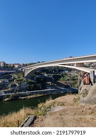 Porto, Portugal - 22 July 2022: View Of Iconic Dom Luís I Bridge In Porto On A Sunny Day