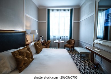 Porto, Portugal. August 16th, 2021. A Room At A Luxury Boutique Hotel With Bed And Window During Day Time. 