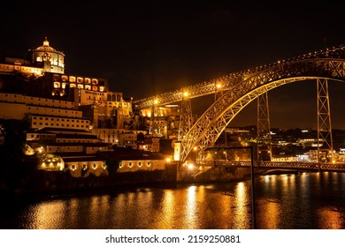 Porto, Portugal – June 05, 2021: Night Shot Of Porto Looking Towards Vila Nova De Gaia, With The Illuminated 