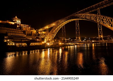 Porto, Portugal – June 06, 2021: Night Shot Of Porto Looking Towards Vila Nova De Gaia, With The Illuminated 