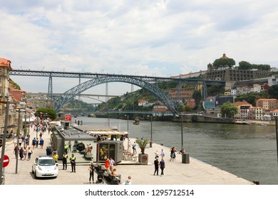 PORTO, PORTUGAL - JUNE 21, 2018: Porto Old Town, Portugal.  Panoramic View At Ponte Dom Luis I On Douro River And Medieval Monastery Fort Mosteiro Da Serra Do Pilar.