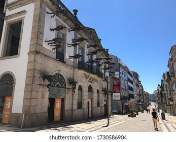 Porto / Portugal - May 10, 2020: Porto City Center. Santa Catarina Street And Santa Catarina Shopping Mall. Empty Streets Due To Covid-19. Few People On The Street Due To Coronavirus.