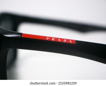 Porto, Portugal - May 8 2022: Prada Logo On A Pair Of Prada Luxury Sunglasses