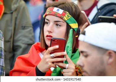 PORTO, PORTUGLAL - June 09, 2019: Portuguese fans and spectators in the stands support the team during the UEFA Nations League Finals match between Portugal and Netherlands, Portugal - Shutterstock ID 1431917540
