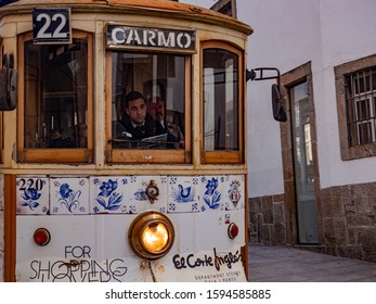 Porto, Purtugal. 15 November 2019. Driver Of Historic Streetcar In The Front Of A Traditional Streetcar Seen From The Outside.