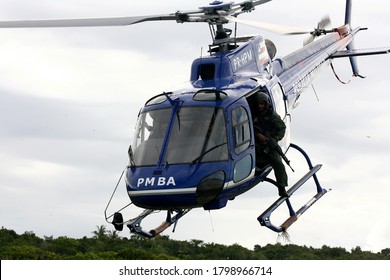 porto seguro, bahia / brazil - june 20, 2011: helicopter model Esquilo AS350, prefix PR-HPM, from the military police of Bahia is seen during flight in the city of Porto Seguro.