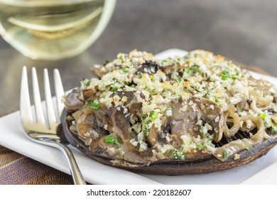 Portobello Mushroom Caps Filled With Shallots And Cremini Mushroom In A White Wine Cream Sauce, Broiled With A Parmesan, Chive And Cilantro Panko Topping