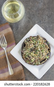 Portobello Mushroom Caps Filled With Shallots And Cremini Mushroom In A White Wine Cream Sauce, Broiled With A Parmesan, Chive And Cilantro Panko Topping