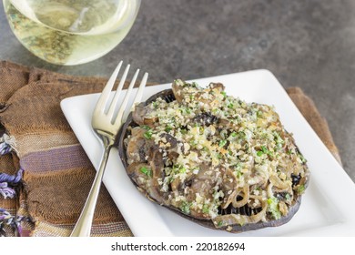 Portobello Mushroom Caps Filled With Shallots And Cremini Mushroom In A White Wine Cream Sauce, Broiled With A Parmesan, Chive And Cilantro Panko Topping