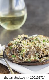 Portobello Mushroom Caps Filled With Shallots And Cremini Mushroom In A White Wine Cream Sauce, Broiled With A Parmesan, Chive And Cilantro Panko Topping