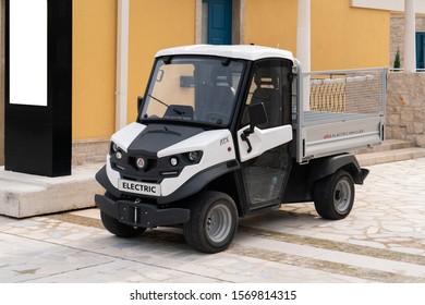 Portonovi, Montenegro - November, 2019: Alke' ATX Electric Utility Vehicle On A City Street.