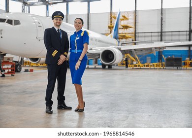 Portrair Of Plane Crew In Hangar Of Technical Service