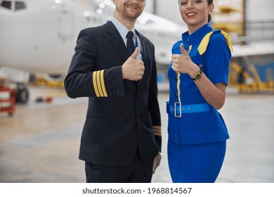 Portrair Of Plane Crew In Hangar Of Technical Service