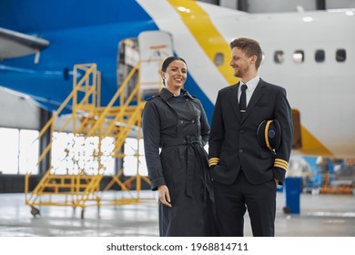 Portrair Of Plane Crew In Hangar Of Technical Service