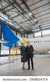 Portrair Of Plane Crew In Hangar Of Technical Service