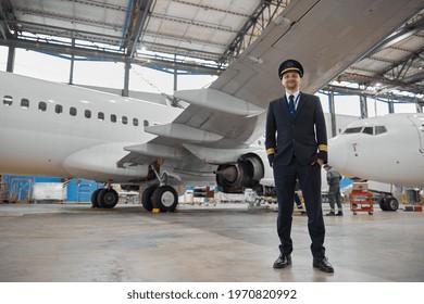 Portrair Of Plane Crew In Hangar Of Technical Service