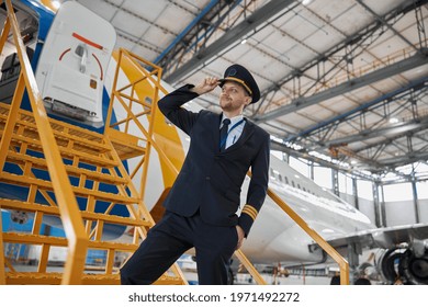 Portrair Of Plane Crew In Hangar Of Technical Service