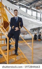 Portrair Of Plane Crew In Hangar Of Technical Service