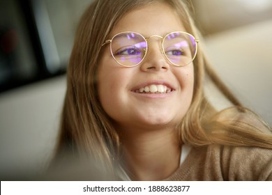 Portrait of 10-year-old blond girl with eyeglasses
