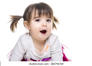 A Portrait Of A 2 Year Old Girl Isolated On White Background