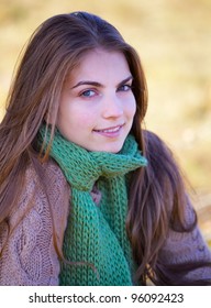 Portrait Of A 20 Year Old Woman Outdoor In Autumn.