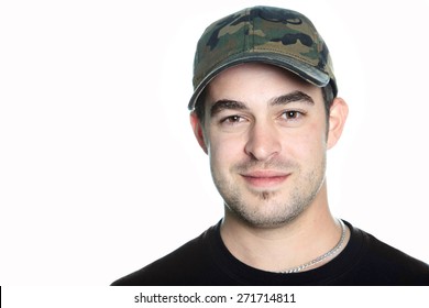 A Portrait Of A 30 Years Old Men With A Cap.