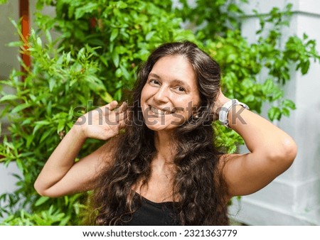 Similar – Lateinische Frau lacht, fröhliche Sommerlaune.