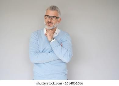 Portrait Of 40 Year Old Man, Isolated On Grey Background