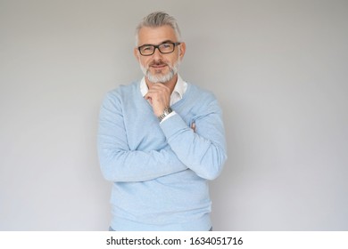 Portrait Of 40 Year Old Man, Isolated On Grey Background