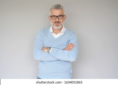 Portrait Of 40 Year Old Man, Isolated On Grey Background