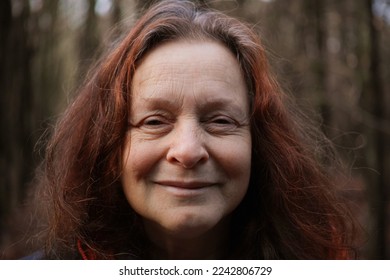 Portrait of a 60 year old smiling woman without make-up - Shutterstock ID 2242806729