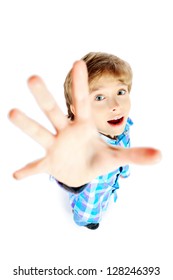 Portrait Of A 9 Year Boy Pulling His Hand Up. Isolated Over White Background.