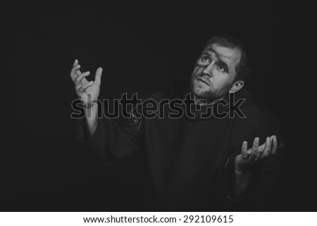 Portrait of the actor in the form of Quasimodo. Theater, stage make-up. Theatrical make-up professionally. Emotional acting.