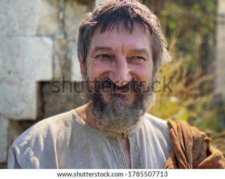 Portrait of an actor in the image of an ancient Greek philosopher.