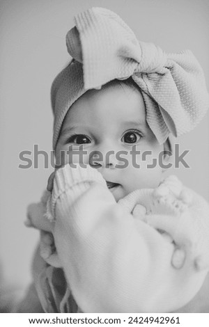 Similar – Baby girl wrapped in a blanket