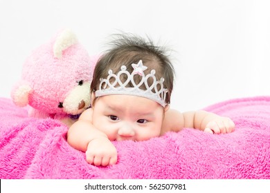 Portrait Of Adorable Baby Girl With Crown