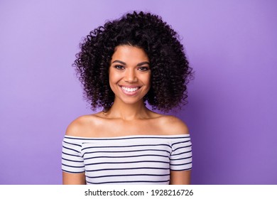 Portrait of adorable cheerful dark skin lady toothy smile look camera isolated on purple color background - Powered by Shutterstock