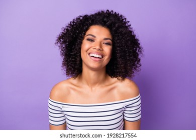 Portrait of adorable dark skin lady toothy smile laughing look camera isolated on purple color background