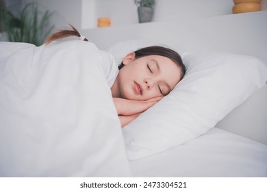 Portrait of adorable lovely little girl sleeping comfy bedroom sweet dreams white light room interior indoors - Powered by Shutterstock