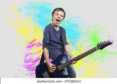 Portrait Of Adorable Young Boy Playing Electric Guitar. Rock And Roll Kid